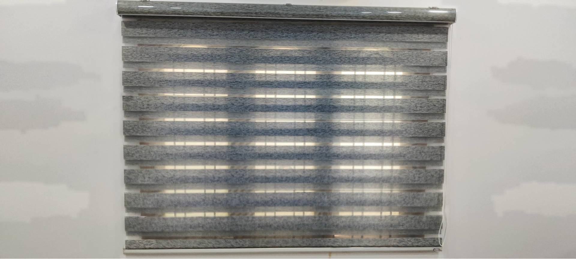 Classic zebra blinds with alternating sheer and solid bands