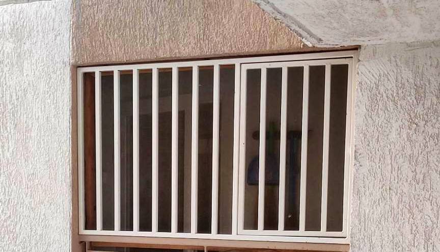Custom window grill installation in Financial District Hyderabad by Perfect Screens