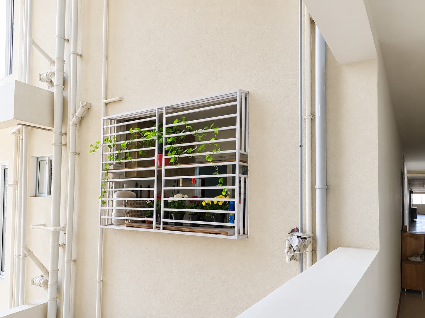decorative window grill with plant space Puppalaguda Hyderabad