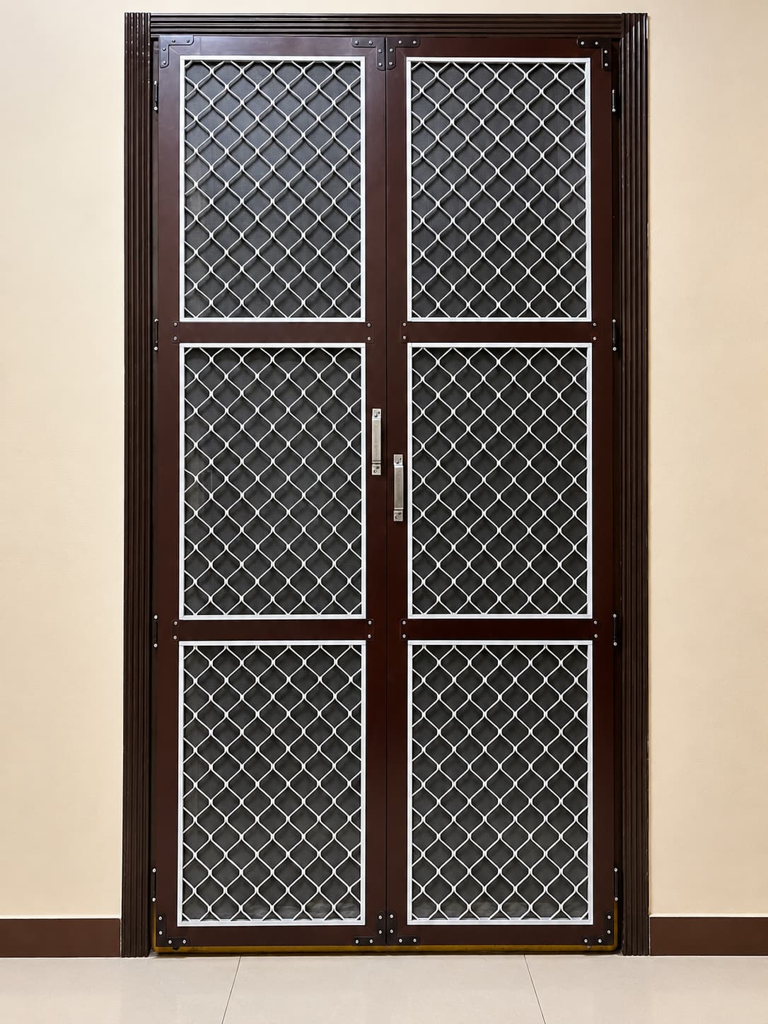 Double-door grill mosquito screen with black frame in Balanagar Hyderabad
