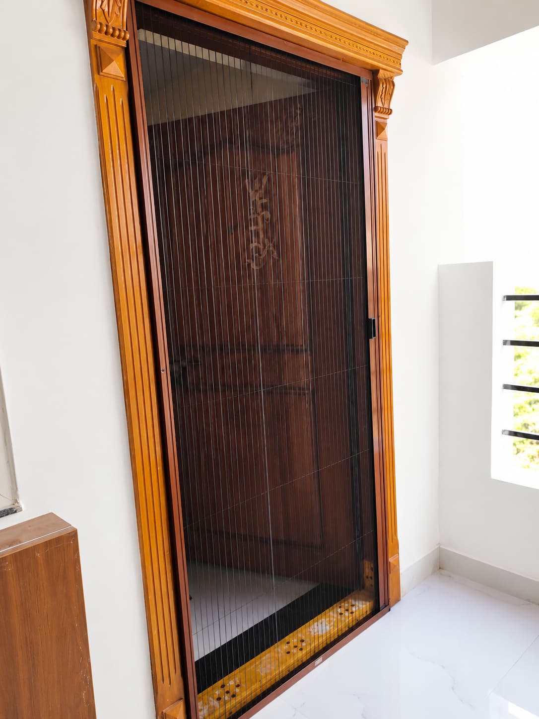 Pleated mosquito screen door for a home entrance in Balanagar Hyderabad